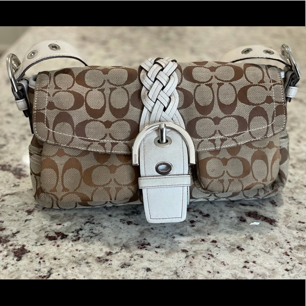 Coach- Small brown and white clutch style purse